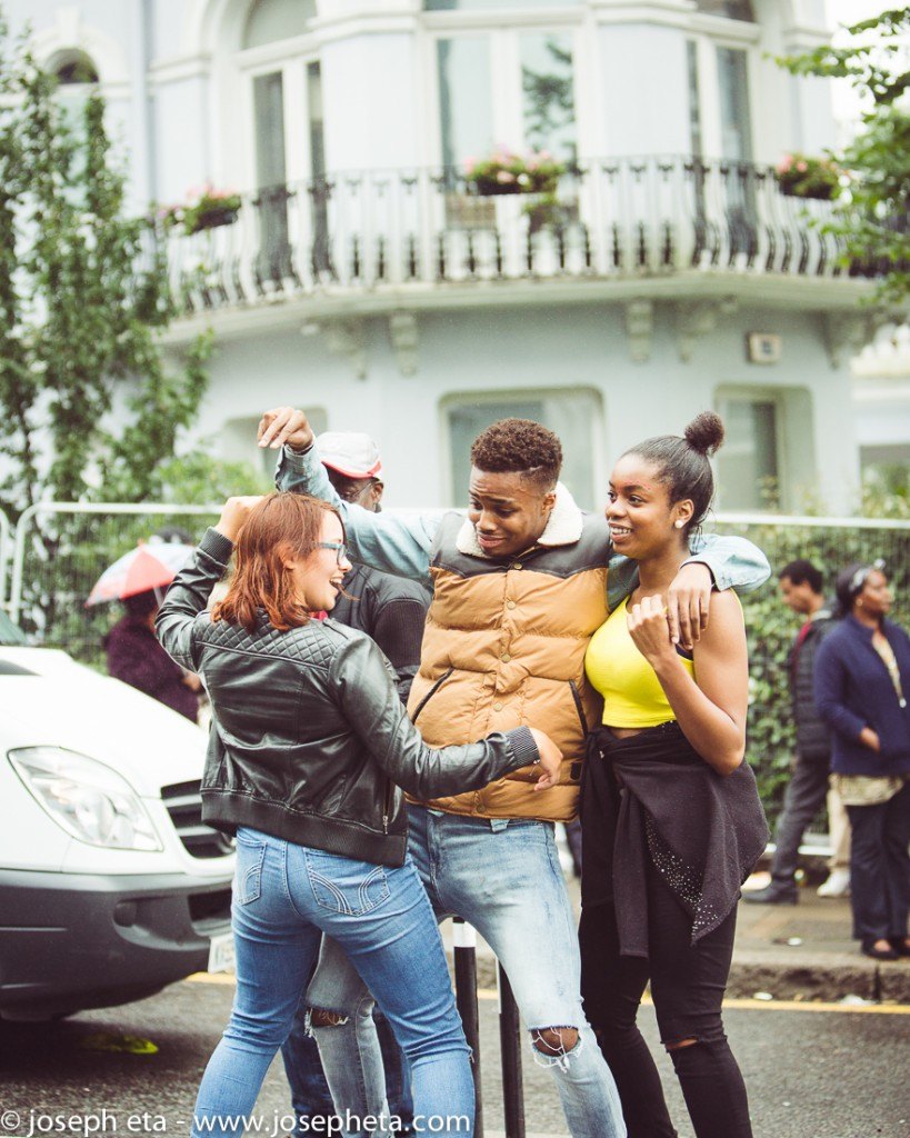 a photo of people dancing at the London Notting Hill Carnival
