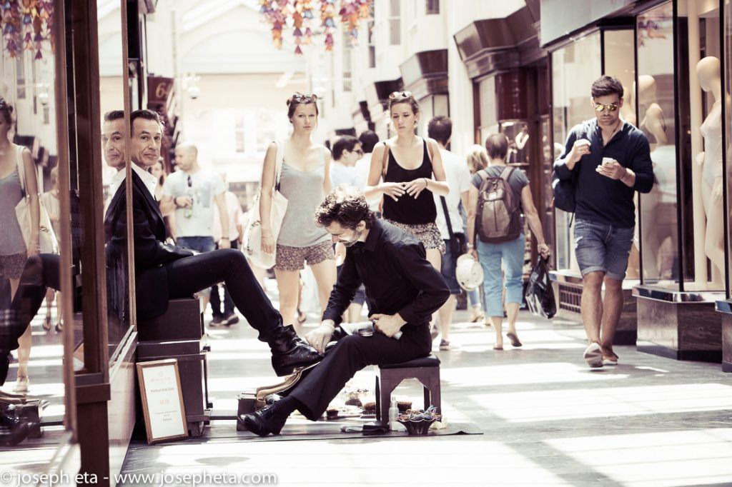 A shoeshiner in the Burlington Arcade in Piccadilly in London