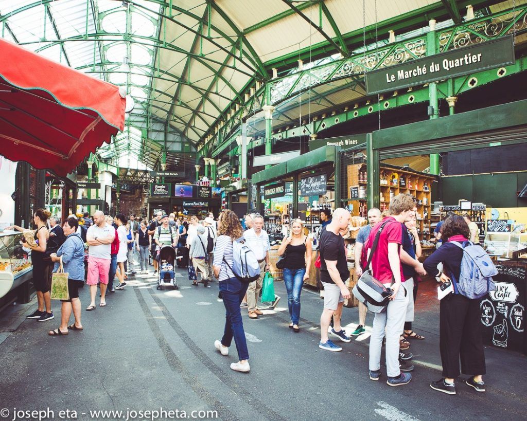 Customers walking around in London Borough market