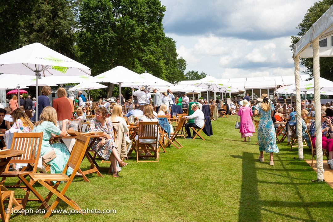People socialising at The Boodles Tennis Challenge tennis tournament