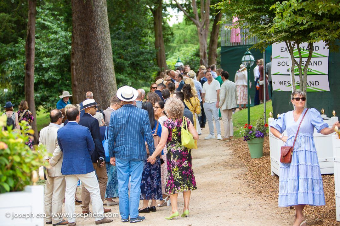 People waiting to take their sears at The Boodles Tennis Challenge