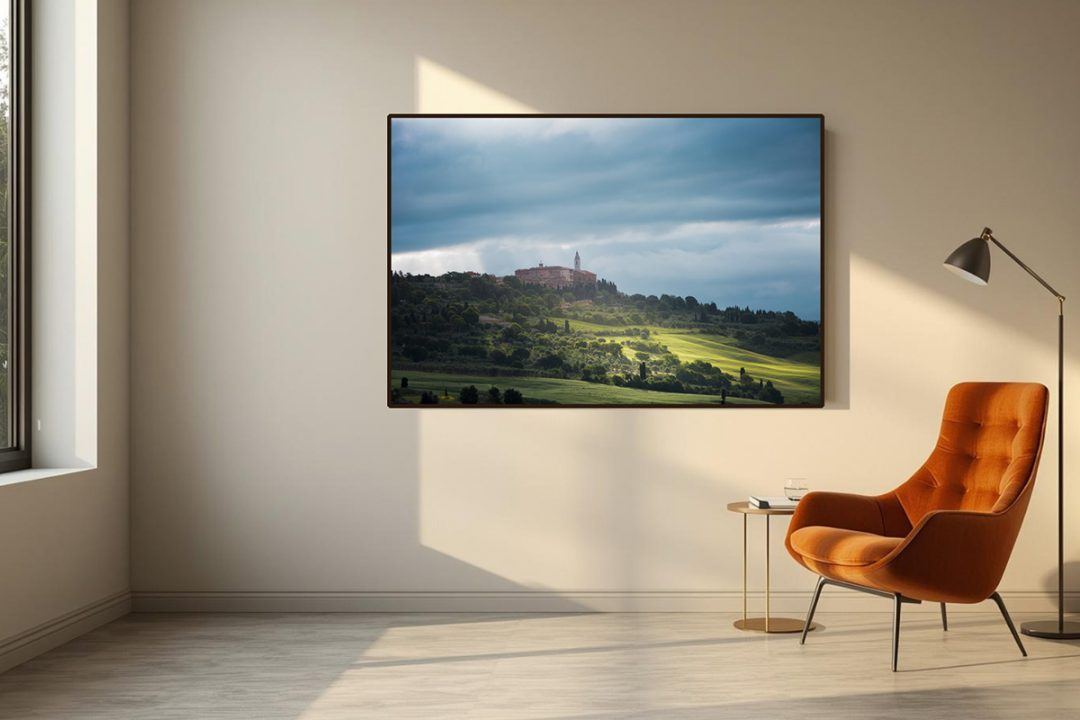 Mockup of biophilic fine art photography featuring a seamless, abstract fine art composition of smooth, biomorphic rocks and morning mist, installed in a large, curved hospital waiting area.