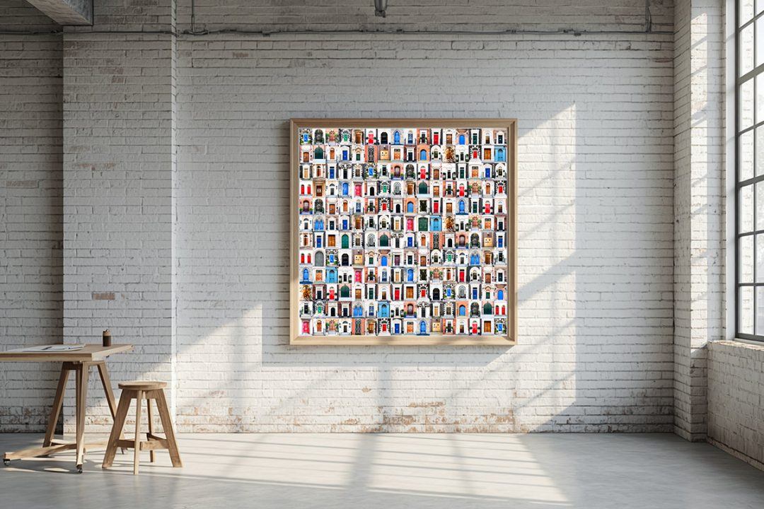 Framed in raw natural oak against distressed white brick in an industrial creative studio. The piece sparks imagination and lateral thinking, mirroring the diverse possibilities explored within a designer's workspace.