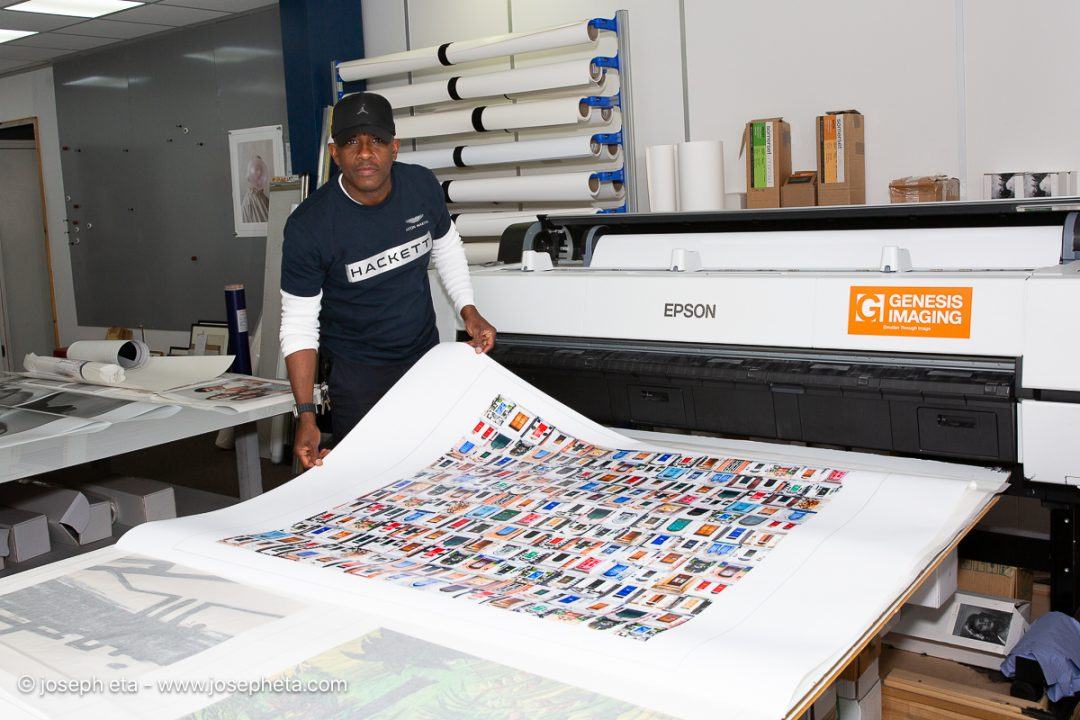 Joseph Eta in a professional photography lab, inspecting a 40x40 inch print of The Architecture Of Opportunities.
