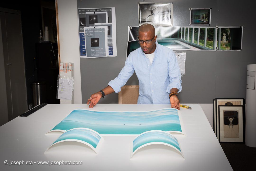 The final curation phase. Every limited-edition print undergoes rigorous inspection to ensure the tonal depth and visual frequency meet strict gallery standards prior to signature.
