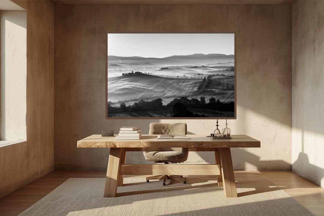 A sanctuary for strategic thought. The Frequency of Vision finds a natural home in this serene, wabi-sabi inspired private study. The raw textures and earthy tones of the space perfectly complement the disciplined, misty landscape of the Tuscan ridge, creating an environment built for profound reflection and uninterrupted focus.
